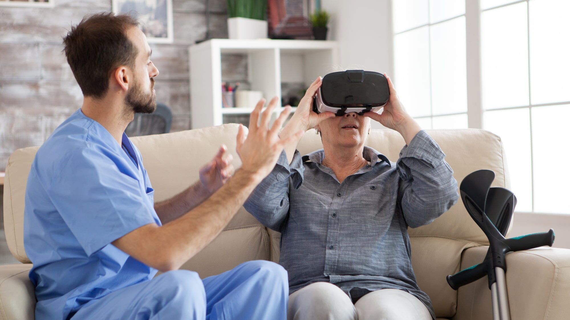 Elderly aged woman using virtual reality glasses